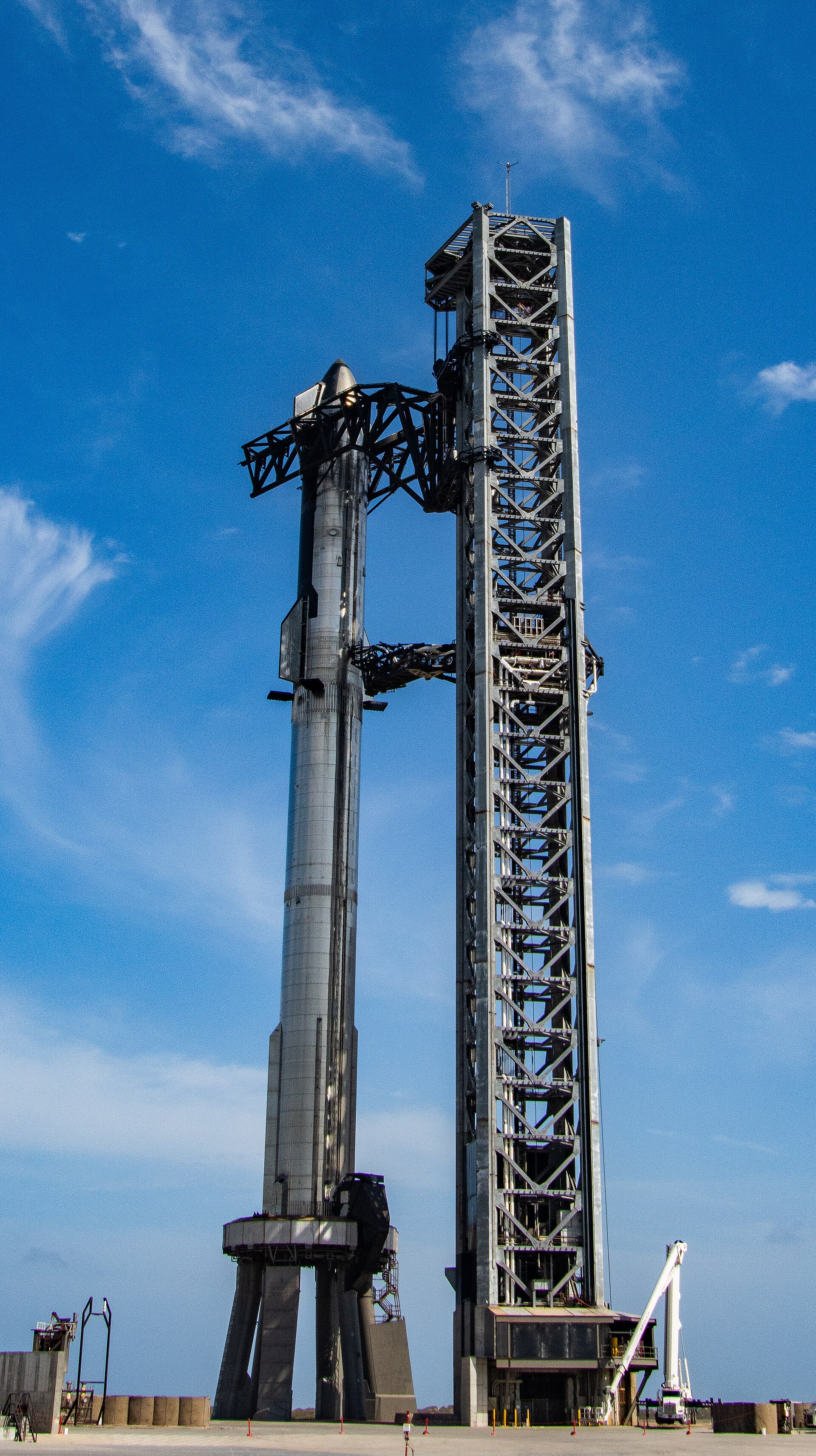 A fully stacked SpaceX Starship vehicle on the launch mount at Boca Chica
