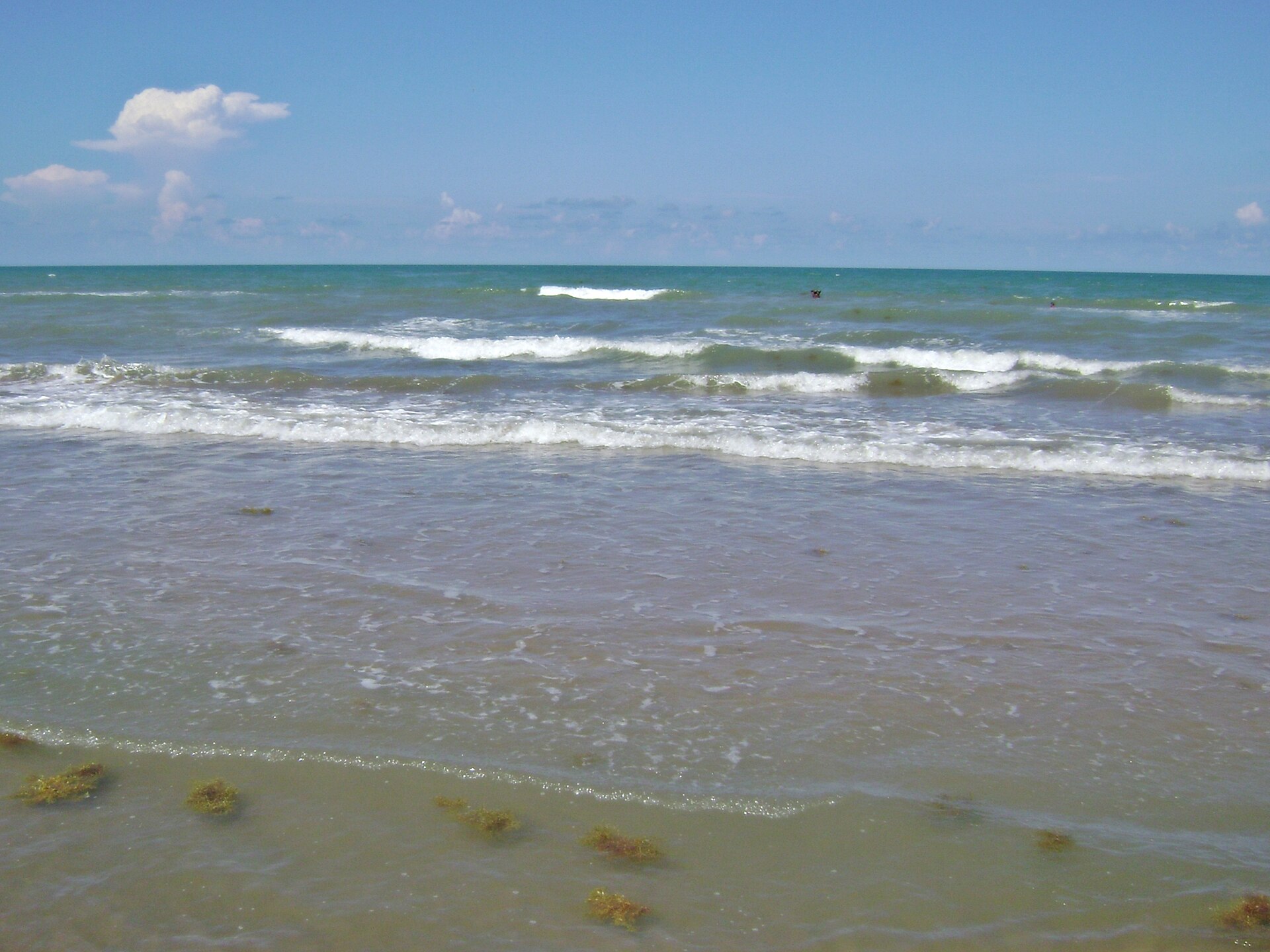 Gulf of Mexico waves breaking on the sand at Boca Chica